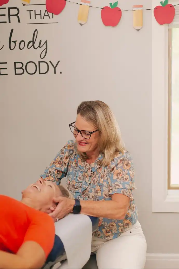 Dr. Cindy Frazier adjusting patient